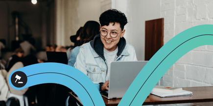 A smiling person types at a laptop, overlaid with the Ultimate connector and a justice hammer icon.