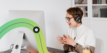 A customer service agent on the phone to a customer.