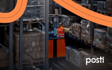 A posti worker in a warehouse